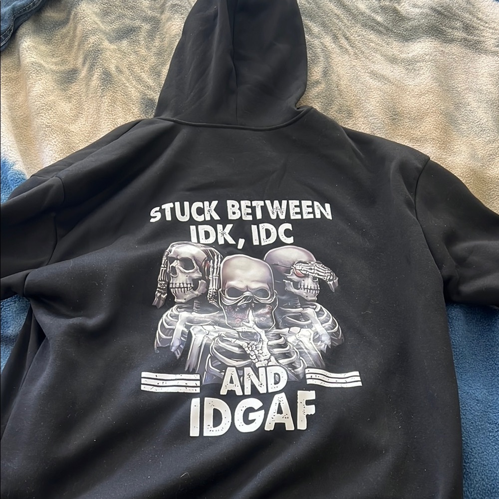 Black Hoodie with Skeleton Graphic and Text . IDK,IDC & IDGAF